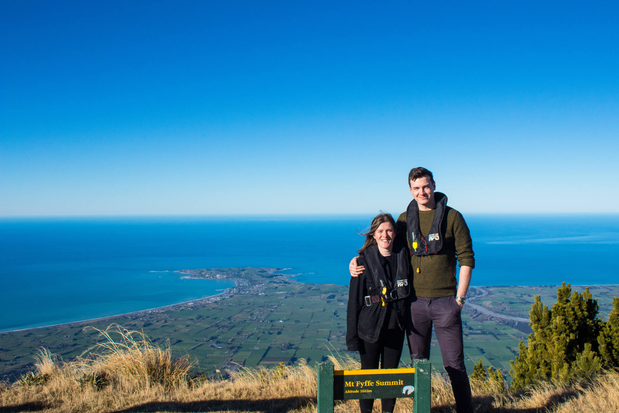 people standing atop mount fyffe kaikoura
