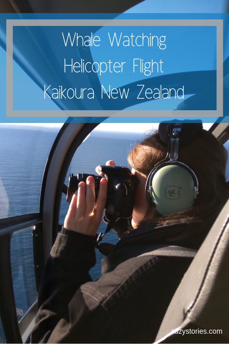 flying in helicopter over mountains